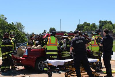 fire crew cuts roof off of car