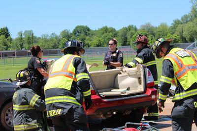 police examine car for evidence