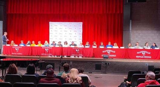 Senior athletes commit to colleges during Letter of Intent Signing Day