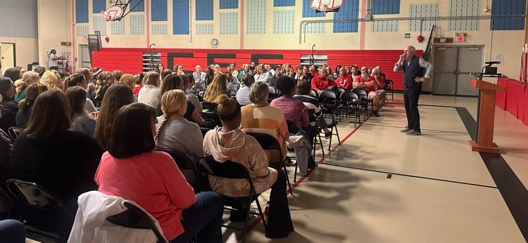 George Scott speaking in css gym to all district staff