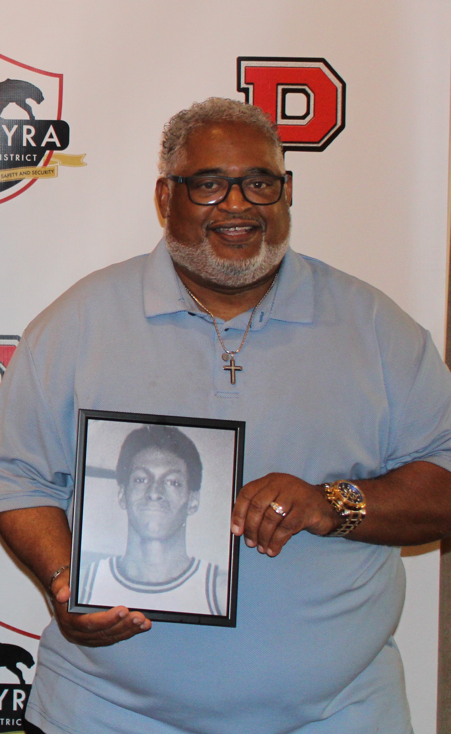 missing an old friend - player holding photo