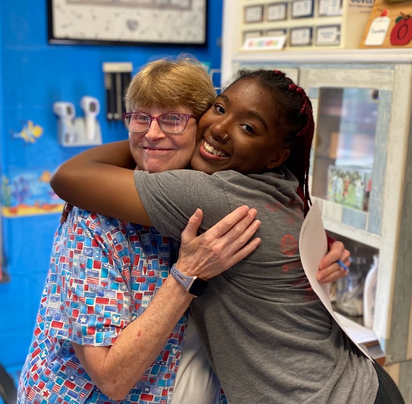 It is so hard not to hug our Nurse, Mrs. McClure