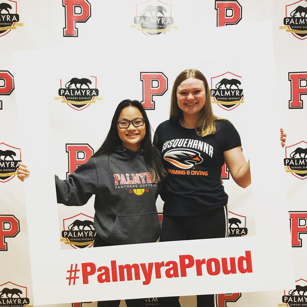 2 past presidents model the new banner