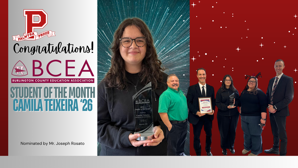 student holding trophy while building leaders support her