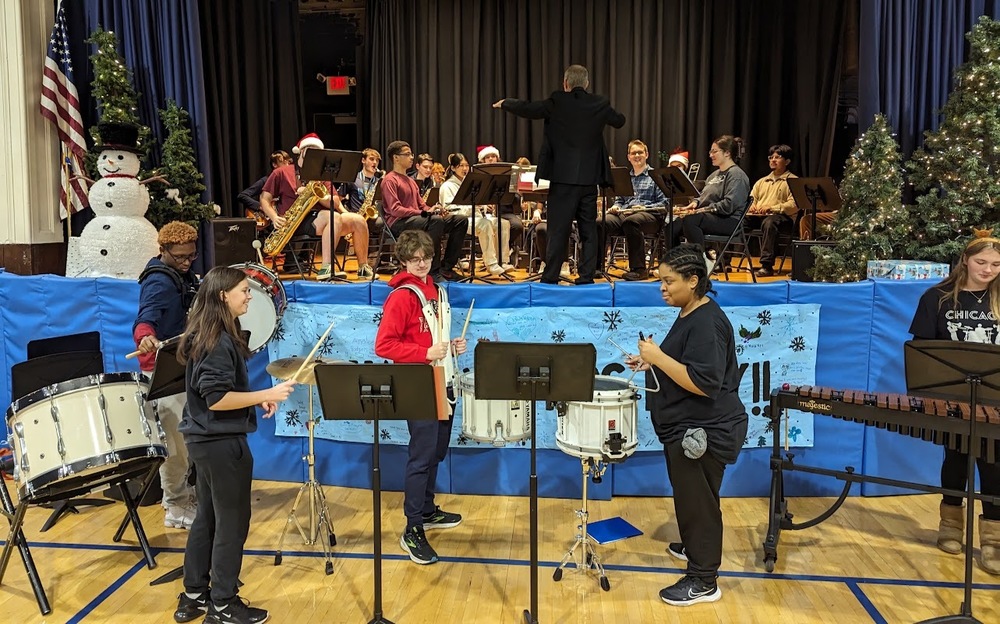 Palmyra Band playing in the gym of Riverton School for the holidays