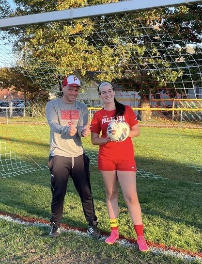 Coach Matt Pap & Julia Ostroff in Goal celebrating her school record