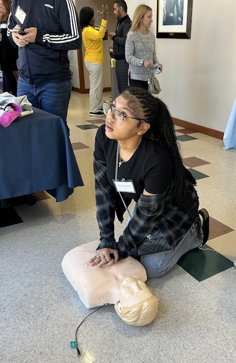 HOSA student learning CPR