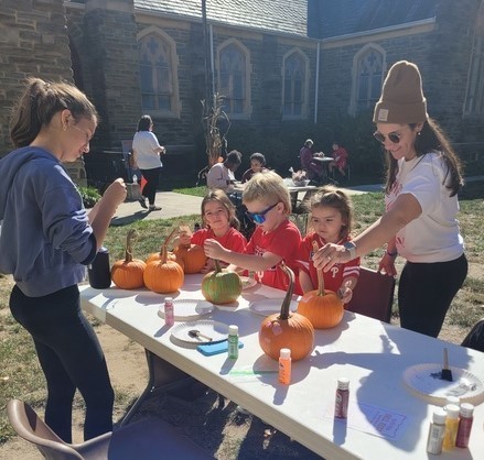 pumpkin painting with interact at fall festival