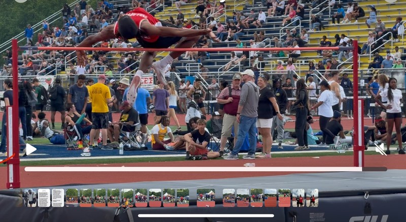 J. Latimore jumping at finals for track