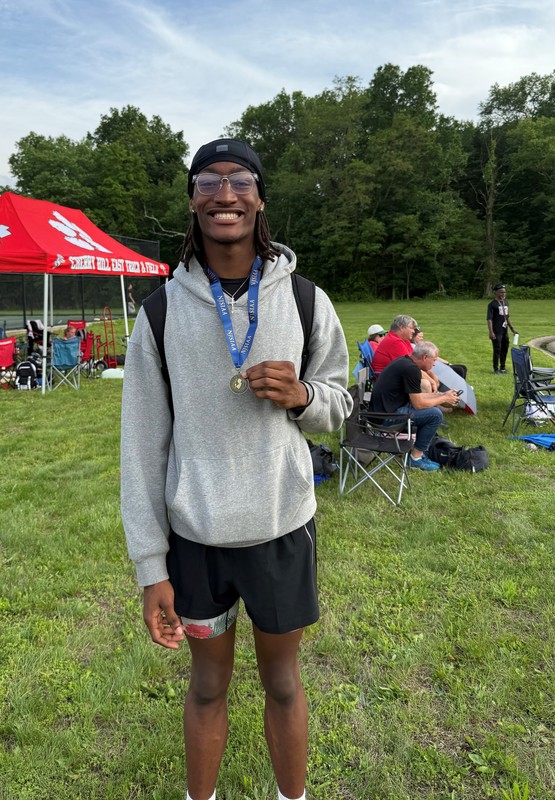 Jaleel sporting his #1 Track Medal at state championships