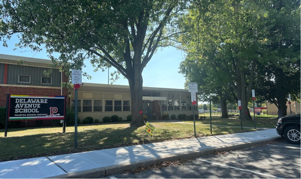 DAS sidewalks replaced - 2 men with jackhammers excavating the old sidewalk