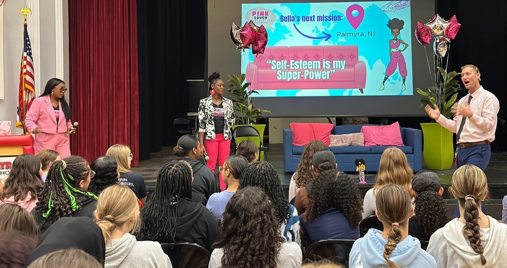 Mr. Devlin introducing the team from Pink Couch Conversations to the 7,8,9 girls