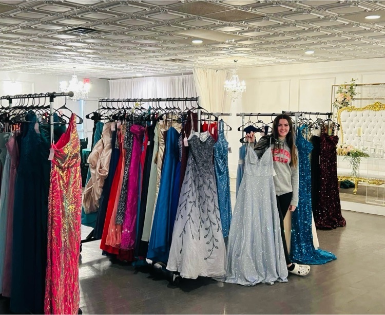 among the gowns in her Palmyra Soccer sweatshirt, Junior Maeve O’Connell
