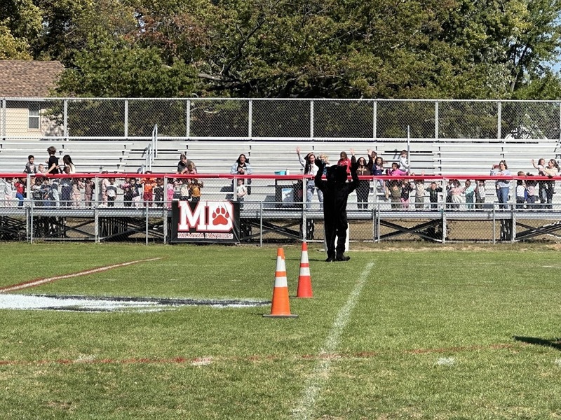 preschoolers cheering on the high school spirit games!