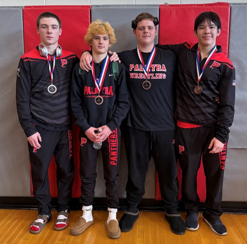 boys with medals at lenape wrestling match