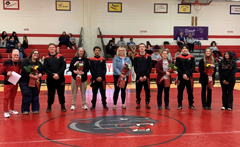 senior wrestlers salute an impactful teacher on senior night
