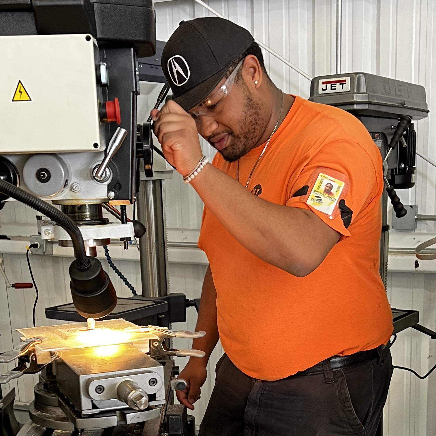 student working on plane parts